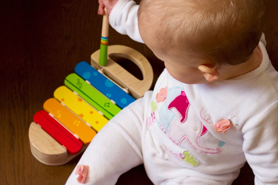 baby-with-musical-instrument